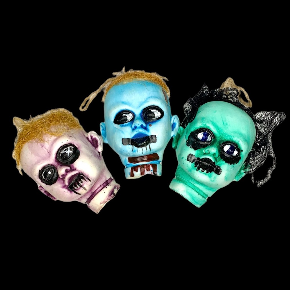 3 Halloween doll heads